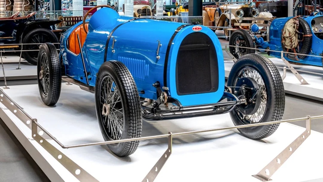 Vintage blue race car on display at Technik Museum Sinsheim.