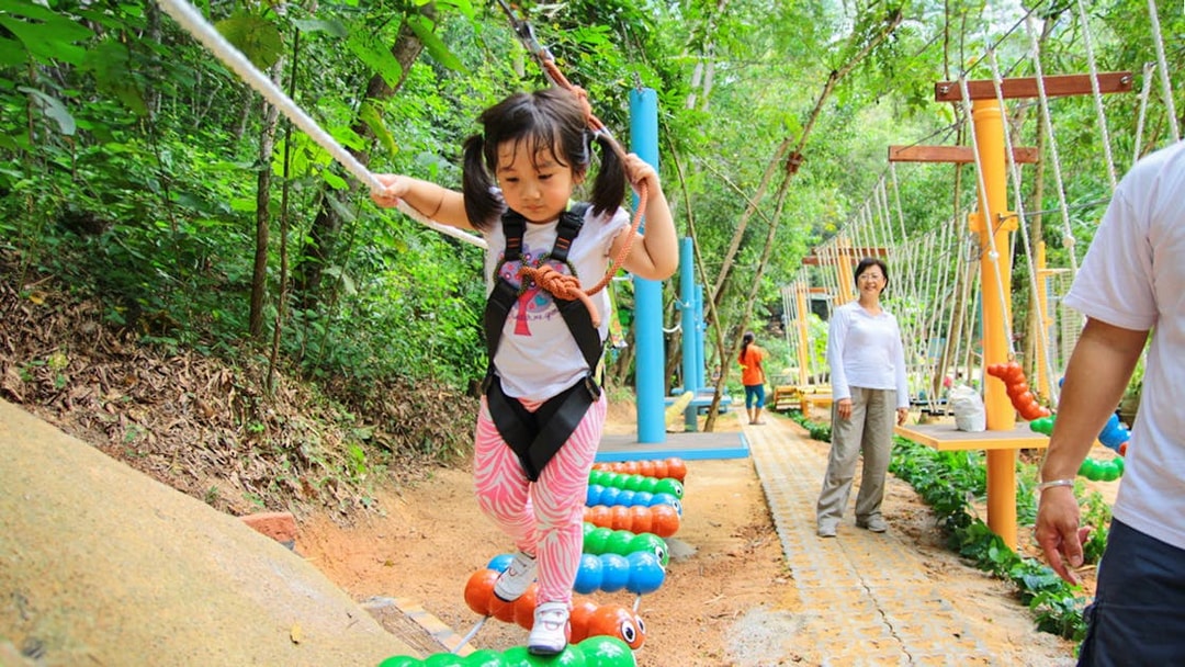 Child balancing on ropes at Monkey School, Escape Penang.