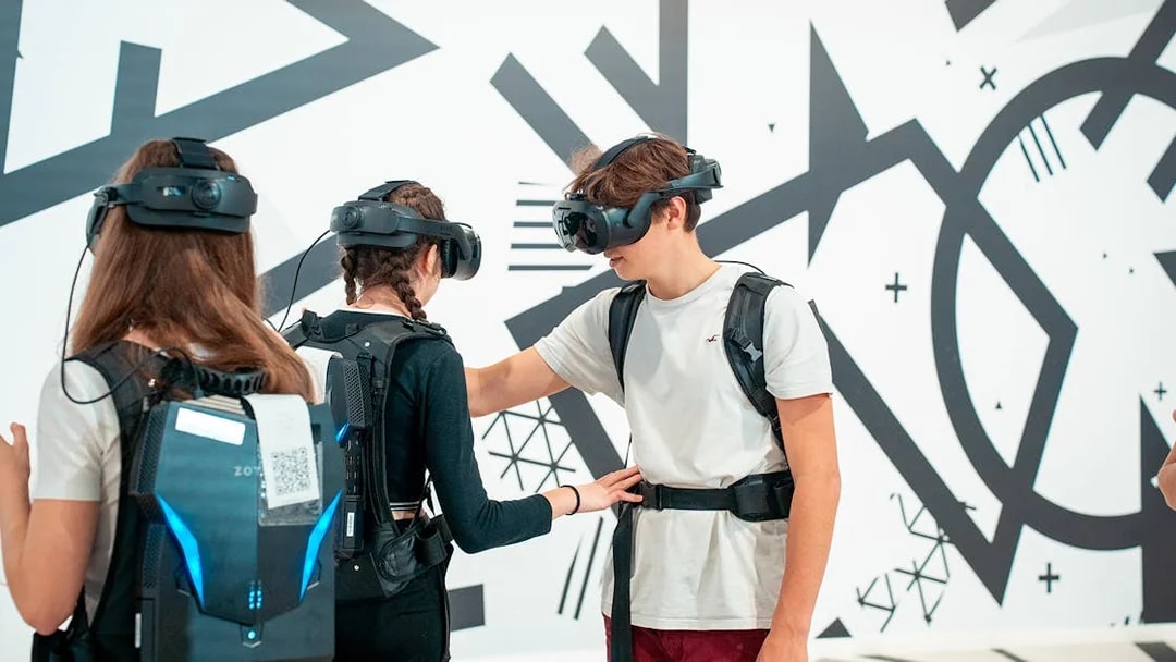 Visitors using VR headsets for the Eternal Notre-Dame experience.