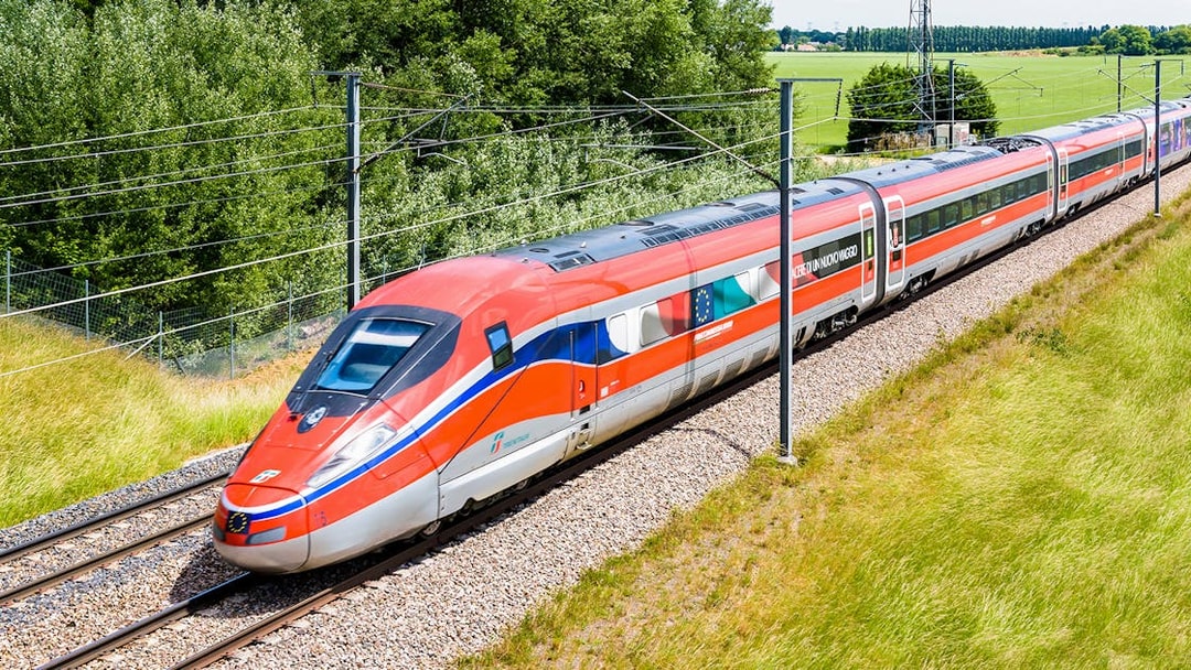 High-speed train on a scenic route, Eurail Global Continuous Pass, 1st Class Seats.