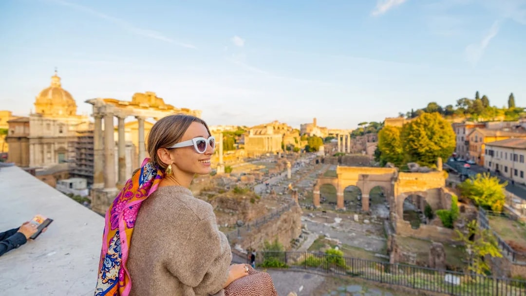 early evening rome: colosseum with arena, trevi fountain and roman forum-5