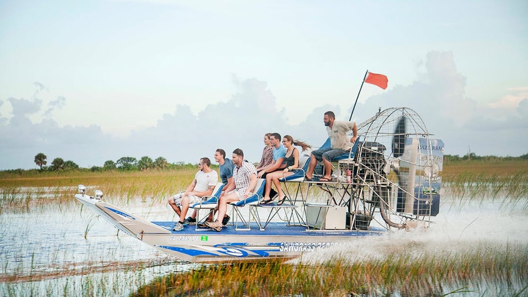 Group enjoying an airboat tour in the Everglades, Florida.