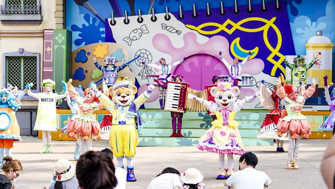 Colorful character performance at Everland theme park show.
