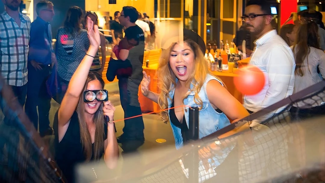 Visitors enjoying interactive exhibits at the Exploratorium in San Francisco.