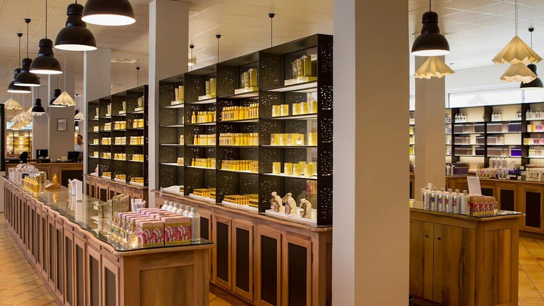 Perfume workshop interior with shelves of fragrance bottles in Eze-Village near Nice and Monaco.