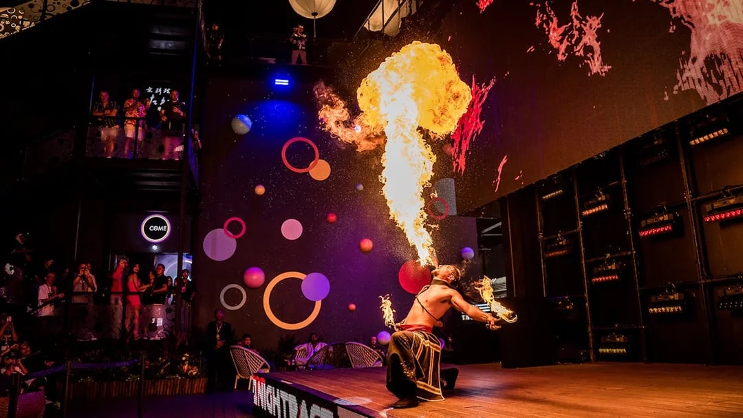 Fire performer at Formula 1 Singapore Grand Prix 2025 hospitality event.