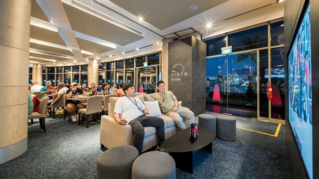 Guests enjoying the Vista Suite during the Formula 1 Singapore Grand Prix 2025 hospitality package.