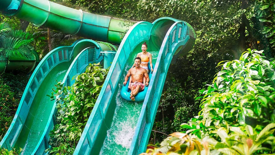 People enjoying the Riptide Rocket ride at Adventure Cove Waterpark, Singapore.
