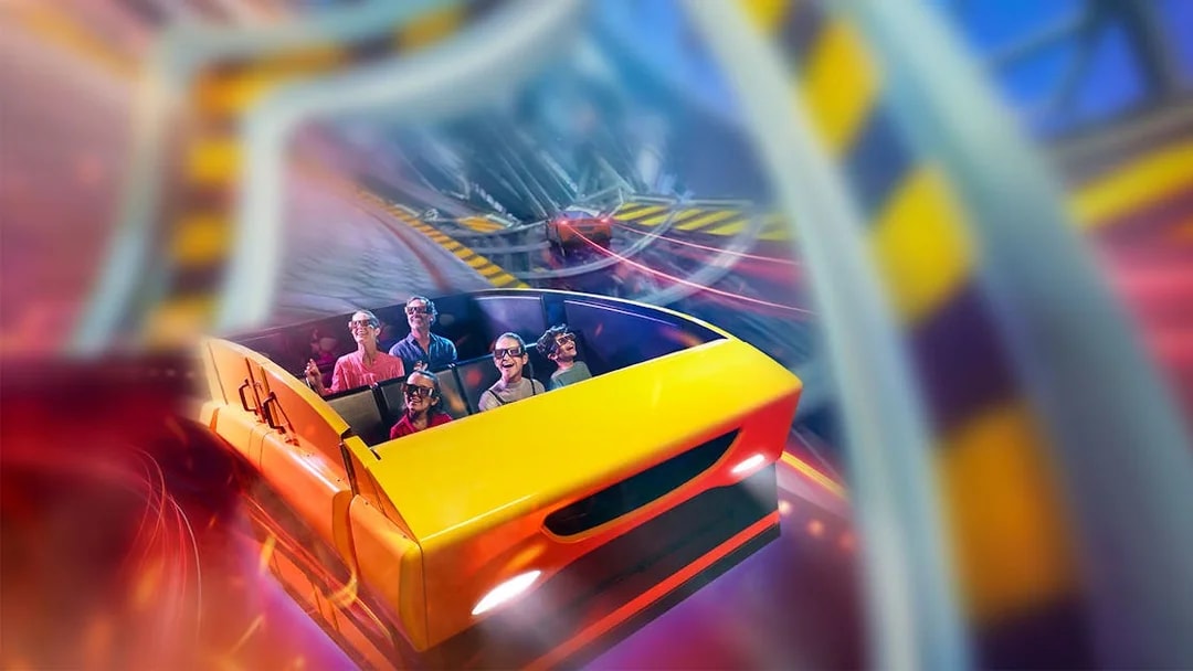 Visitors enjoying a roller coaster ride at Ferrari World Abu Dhabi.