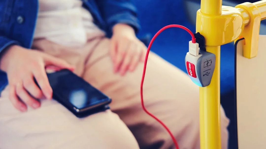 Mobile phone charging on a bus from Fiumicino Airport to Naples.
