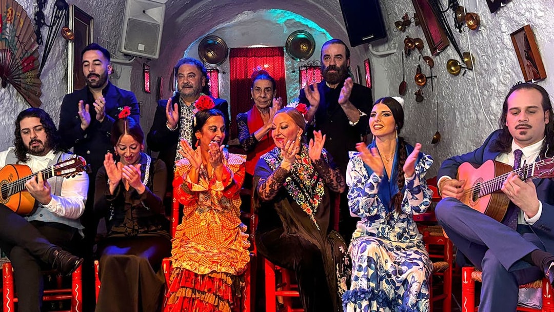 Flamenco dancers and musicians performing at Flamenco Cuevas Los Tarantos, Granada.