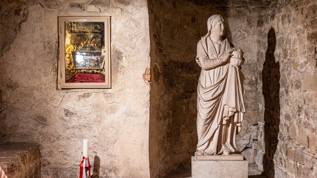 Crypt of Santa Reparata statue and relic display at Florence Cathedral.