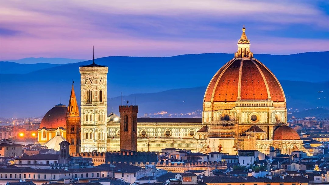 Accademia Gallery and Florence Duomo at sunset, Florence, Italy.