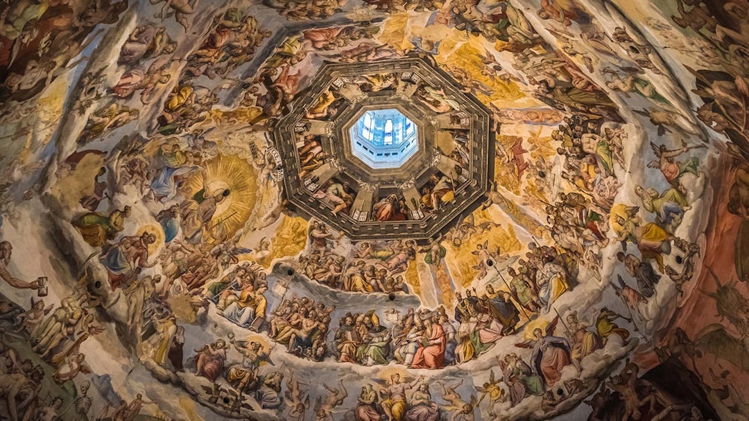 Fresco inside Florence's Duomo dome, depicting religious scenes, part of Accademia Gallery tour.