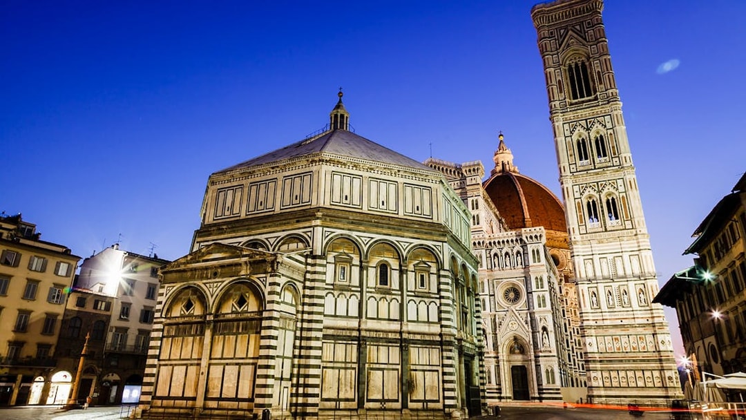 Florence Cathedral and Baptistery at dusk during E-Bike Night Tour.