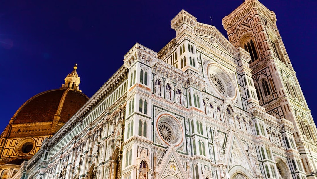 Florence Cathedral illuminated at night during E-Bike Night Tour from Piazzale Michelangelo.