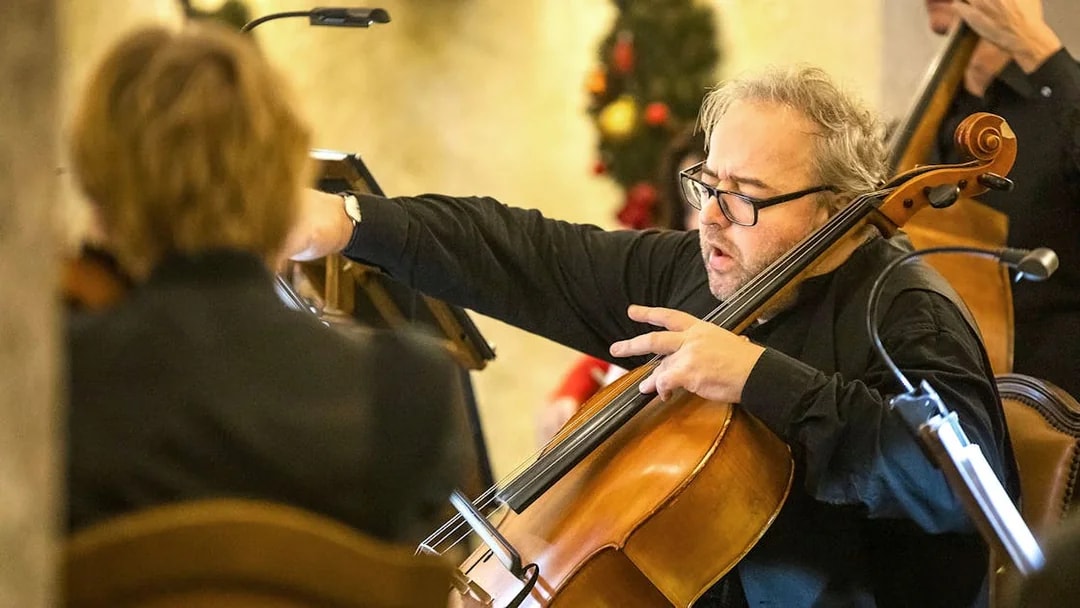 Cellist performing at Fortress Hohensalzburg Christmas Advent Concert.