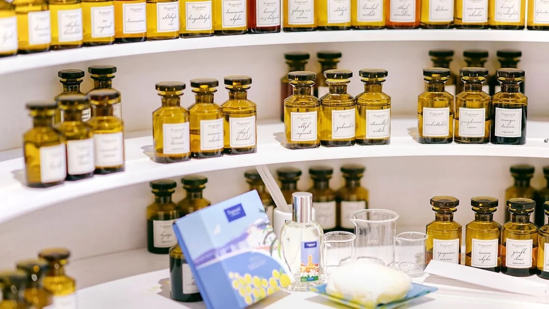 Perfume bottles displayed at Mini Perfume Workshop in Grasse.