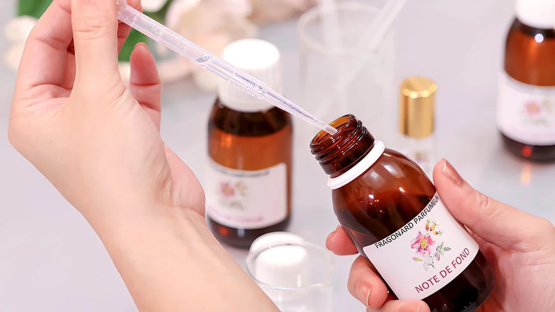 Perfume mixing at Fragonard Perfume Museum workshop in Paris.