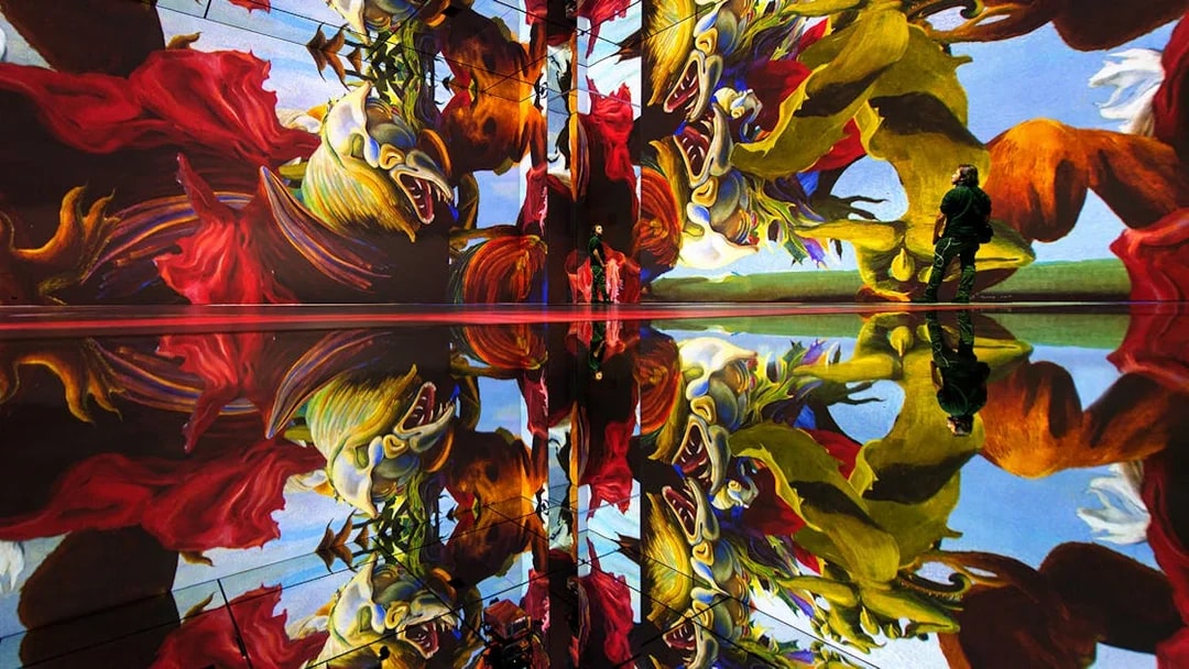 Immersive digital art display at Frameless London with vibrant reflections.
