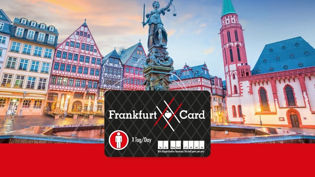 Römerberg square in Frankfurt with historic buildings and Justice Fountain at sunset.