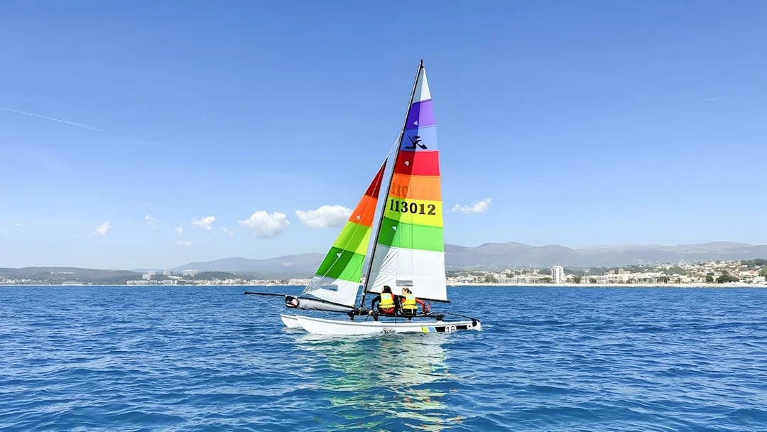 Sailboat on the Mediterranean Sea near the French Riviera coast.