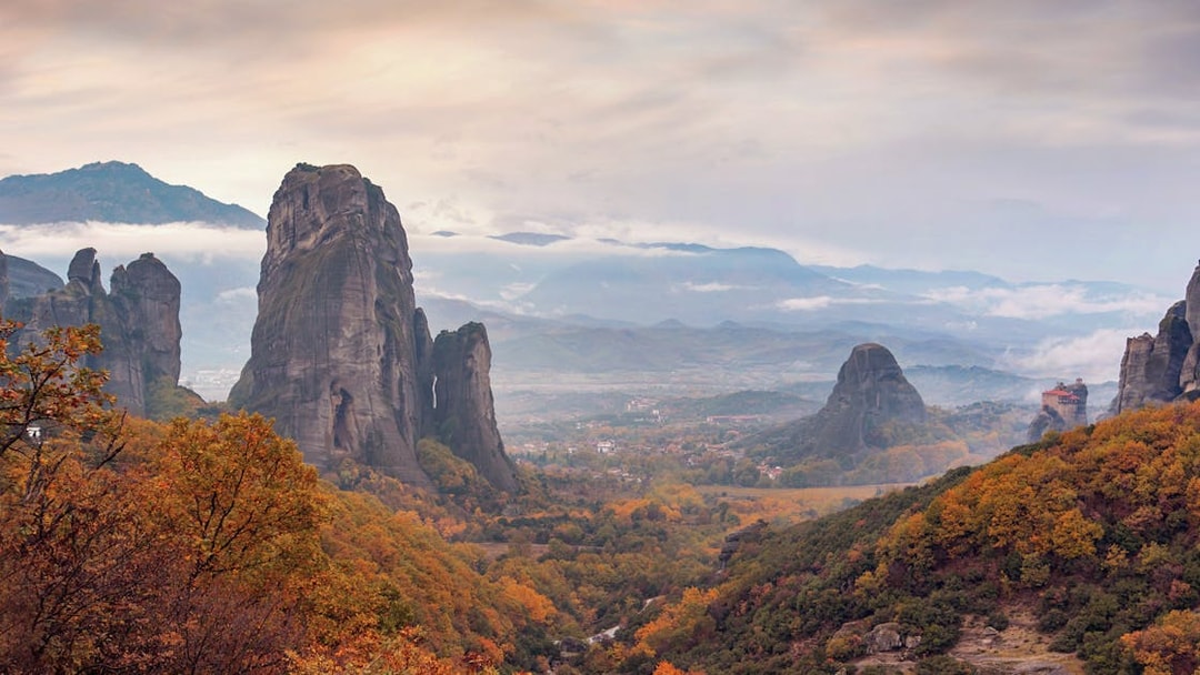 Meteora rock formations with autumn foliage, view from Athens to Meteora full-day trip.