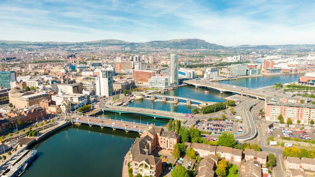Aerial view of Belfast cityscape with bridges over the River Lagan.