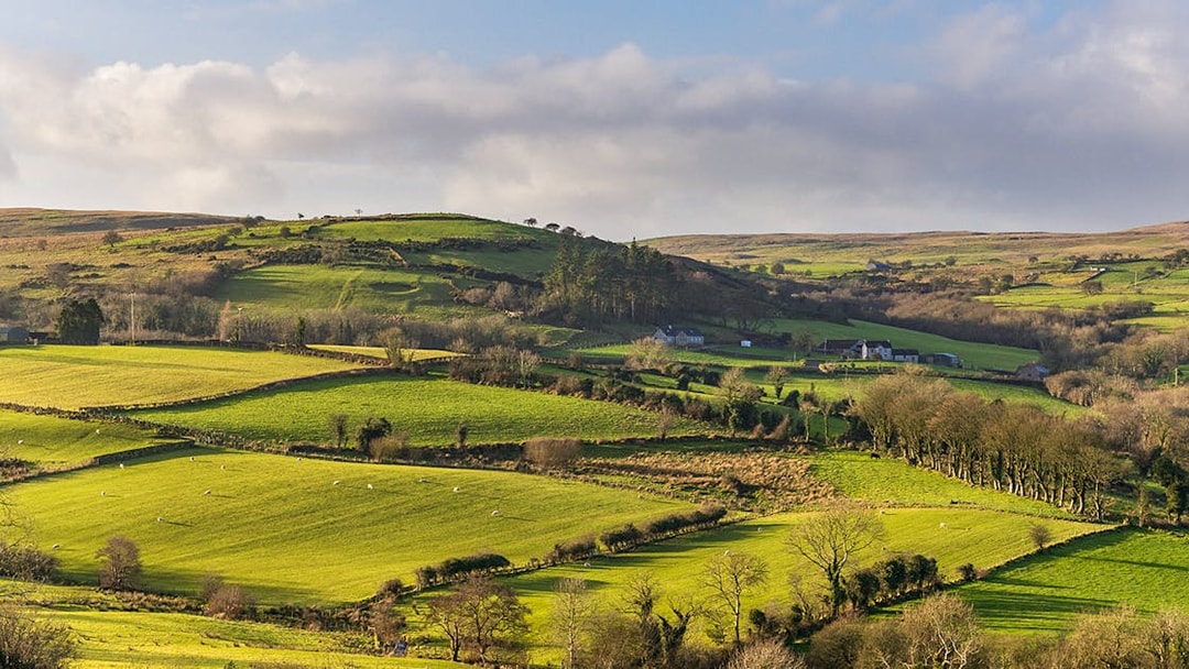 Rolling green hills in Northern Ireland, a filming location for Game of Thrones near Belfast.