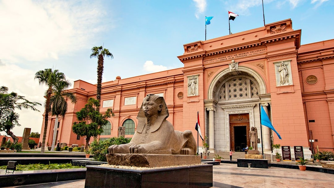 Sphinx statue in front of the Egyptian Museum entrance in Cairo, Egypt.