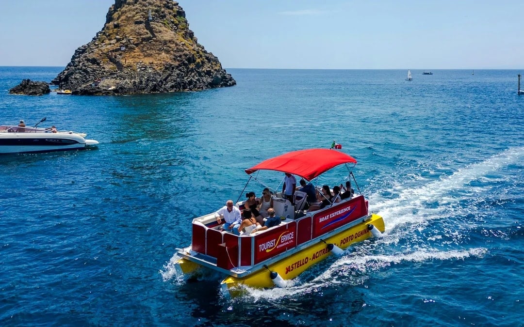 From Catania: Cyclops Coast Boat Tour with Welcome Aperitif and Swimming Stop