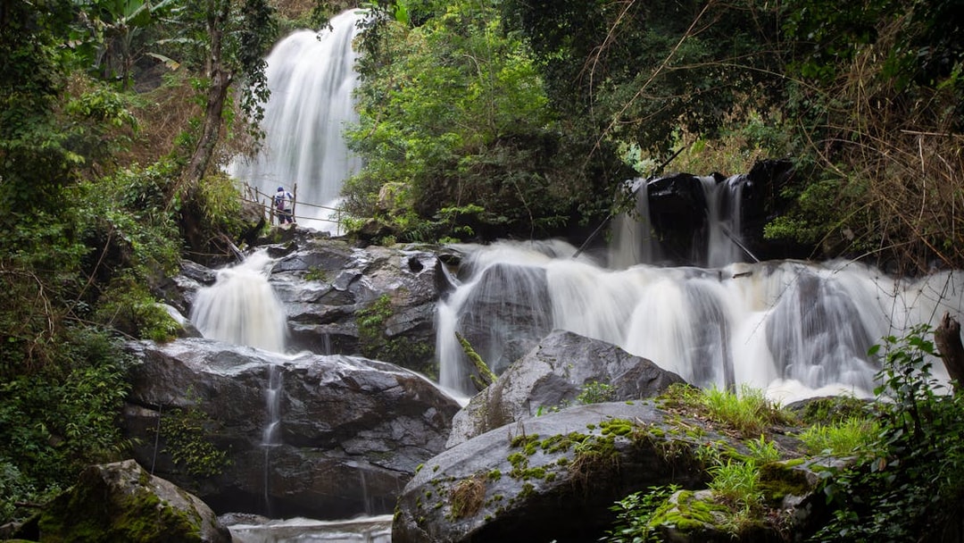 Pha Dok Siew Waterfall cascading through lush forest, Doi Inthanon National Park, Chiang Mai, Thailand.