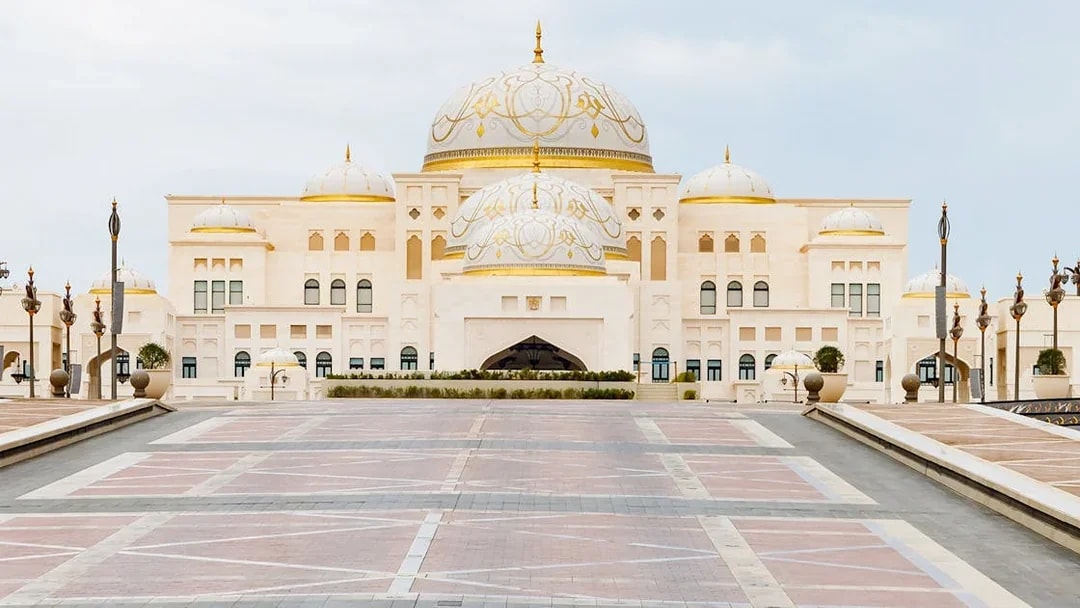 Qasr Al Watan palace in Abu Dhabi with ornate domes and grand entrance.