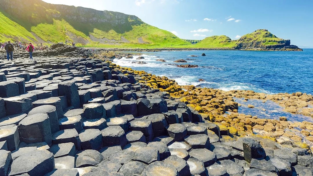 Giant's Causeway basalt columns by the sea in Northern Ireland.