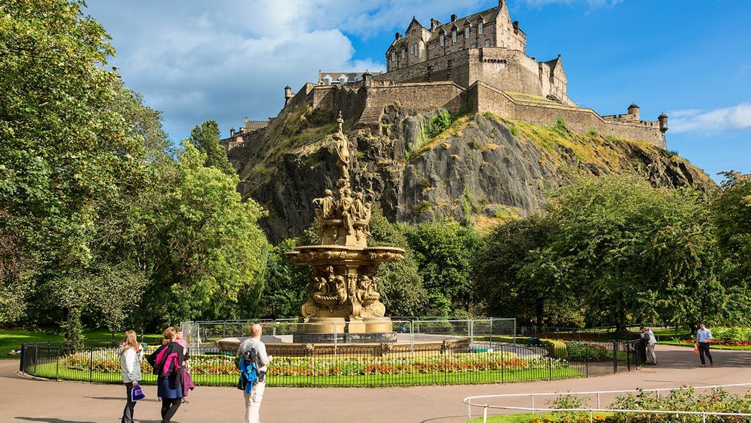 Princes Street Gardens with view of Edinburgh Castle, part of Glenfinnan, Glencoe, and Fort William tour.