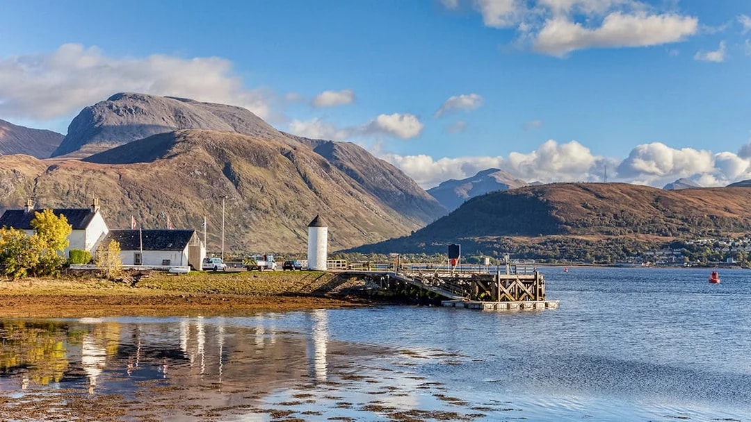 Fort William landscape with mountains and loch, view from Edinburgh tour.