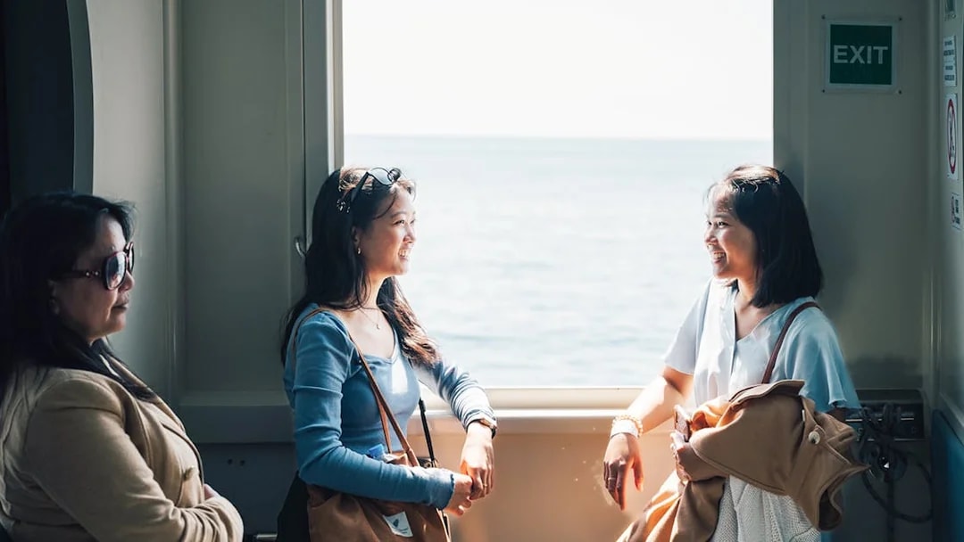 Participants enjoying a boat ride on a day trip in Cinque Terre from Florence.