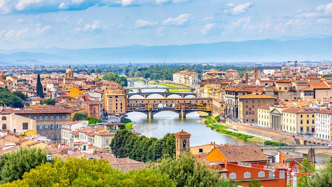 Florence cityscape with Ponte Vecchio and Arno River, Italy day trip.