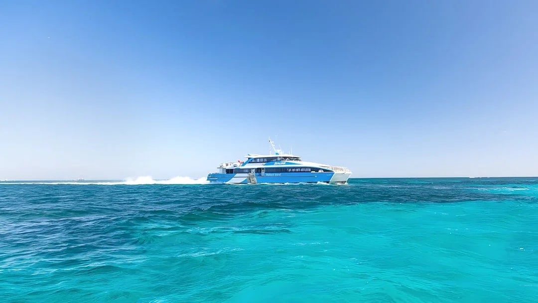 Ferry traveling across turquoise waters to Rottnest Island from Perth or Fremantle.