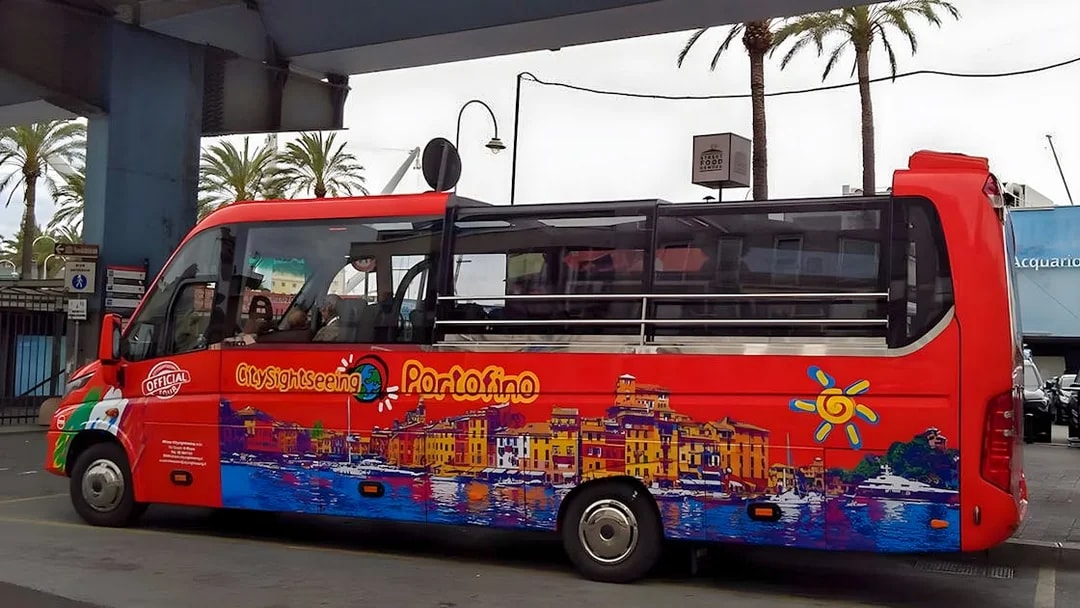 Red sightseeing bus for day trip from Genova to Portofino, Italy.