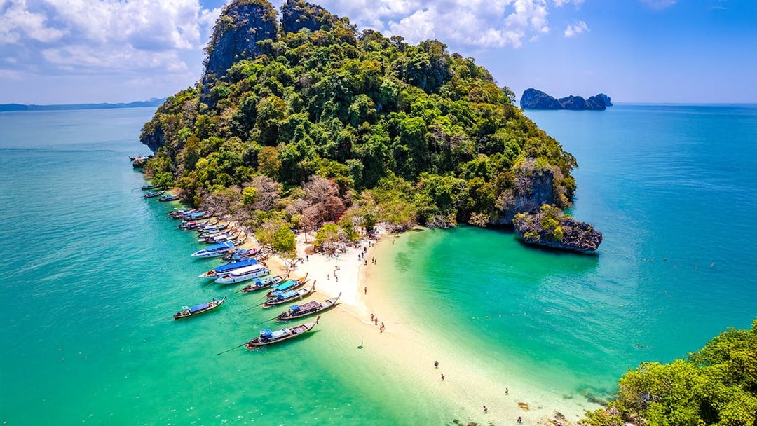 Pak Bia Beach with boats and tourists, Hong Islands, Krabi.