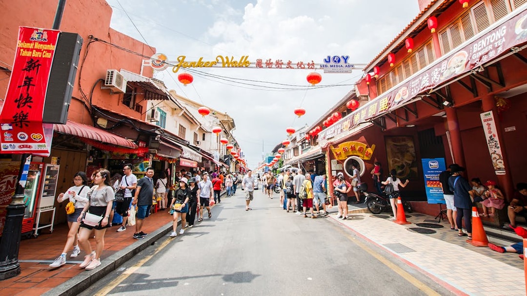 Jonker Street in Melaka bustling with tourists and red lanterns.