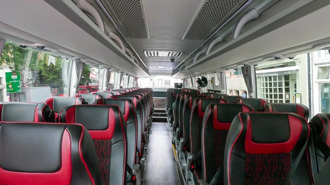 Interior of a tour bus for the Stonehenge and Bath day trip from London.