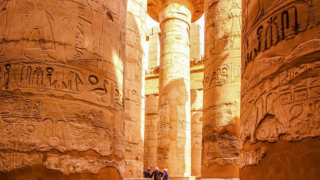 Karnak Temple columns with hieroglyphs, Luxor, Egypt.
