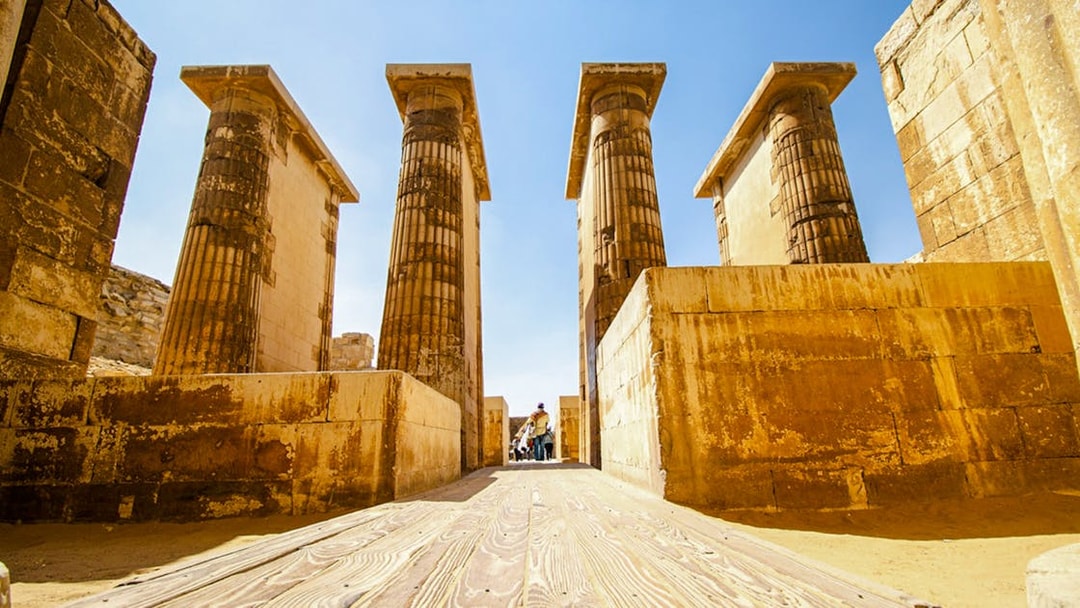 Ancient columns and stone walls inside Luxor Temple, Egypt.