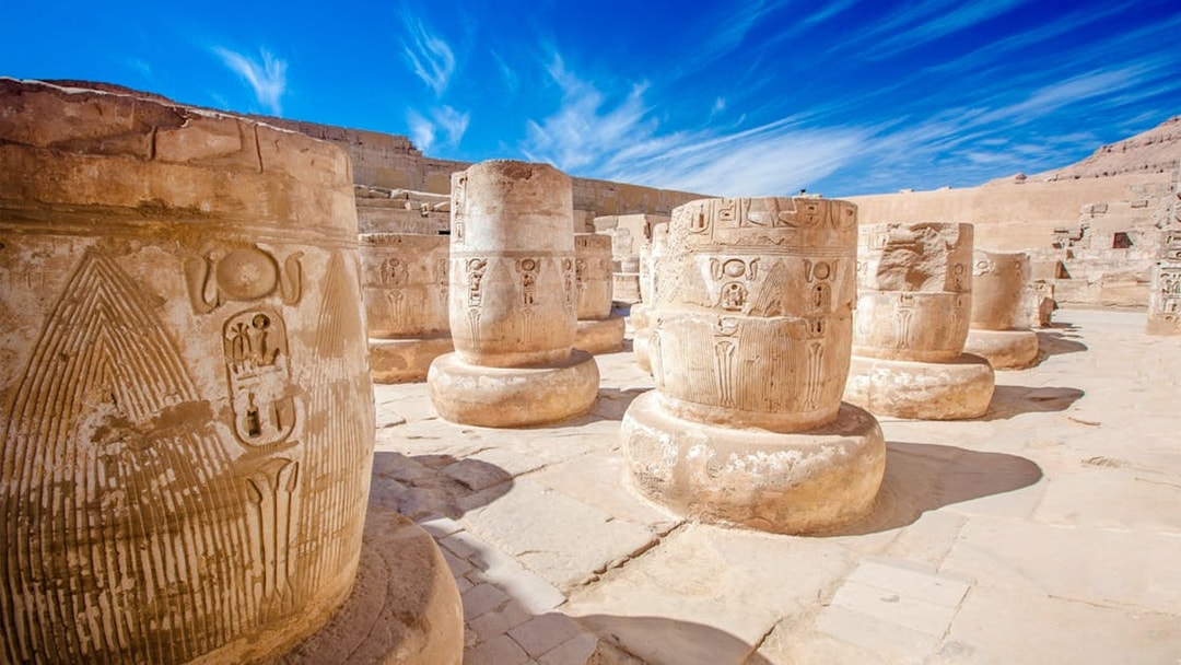 Carved columns with hieroglyphs at Karnak Temple, Luxor, Egypt.