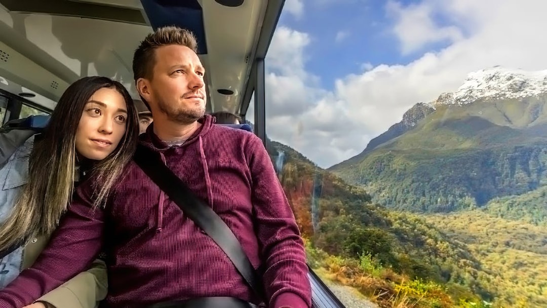 Passengers enjoying scenic views on Doubtful Sound Wilderness Cruise from Manapouri.