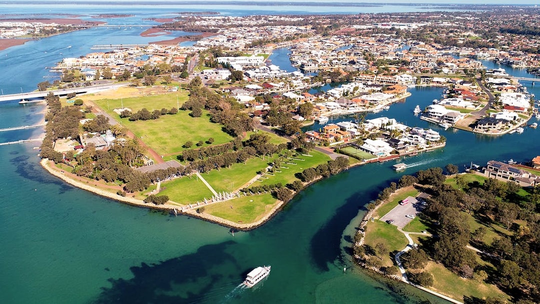 Aerial view of Mandurah's waterways and residential areas in Western Australia.