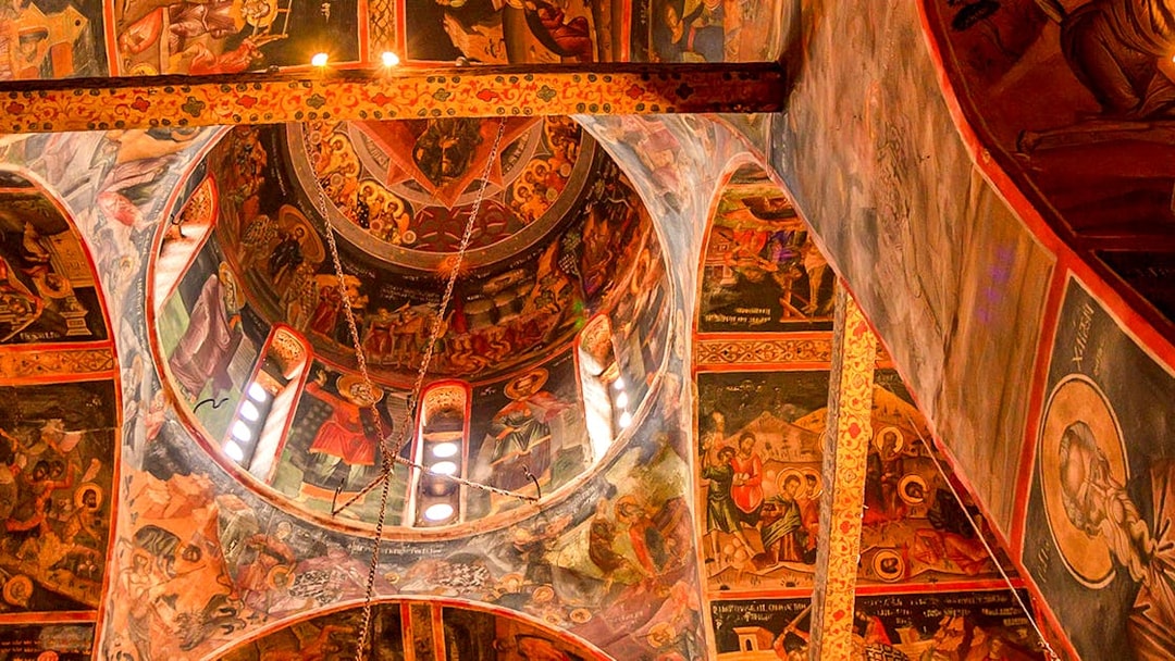 Interior frescoes of Varlaam Monastery, Greece, depicting religious scenes and figures.