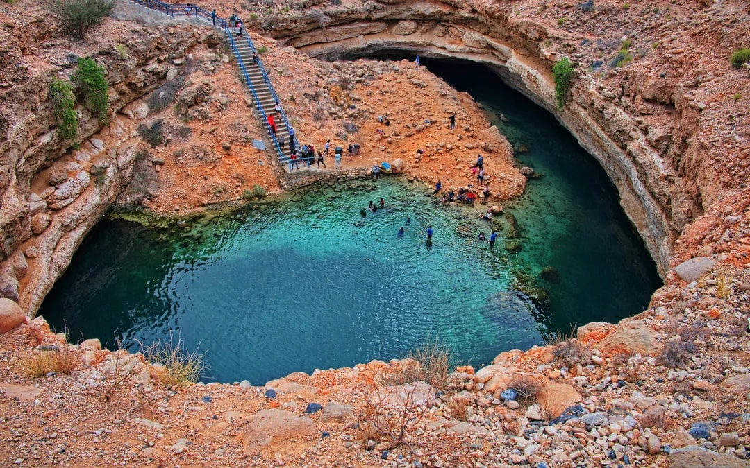 From Muscat: Private Tour of Wadi Shab Hike, Fins Beach Swim & Bimmah Sinkhole Image 4